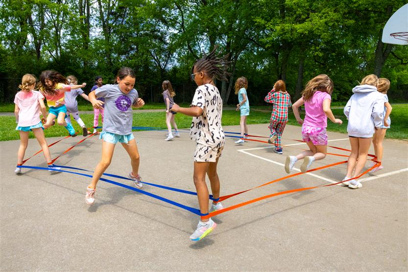 Students dance outside